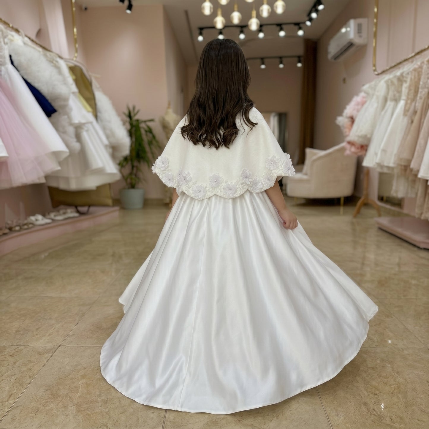 A Beautiful Handcrafted Cape Adorned with Delicate Crystals and Flora