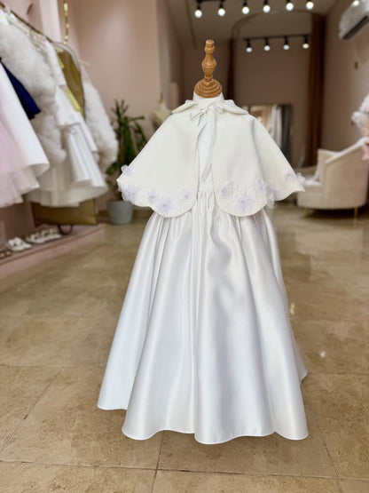 A Beautiful Handcrafted Cape Adorned with Delicate Crystals and Flora