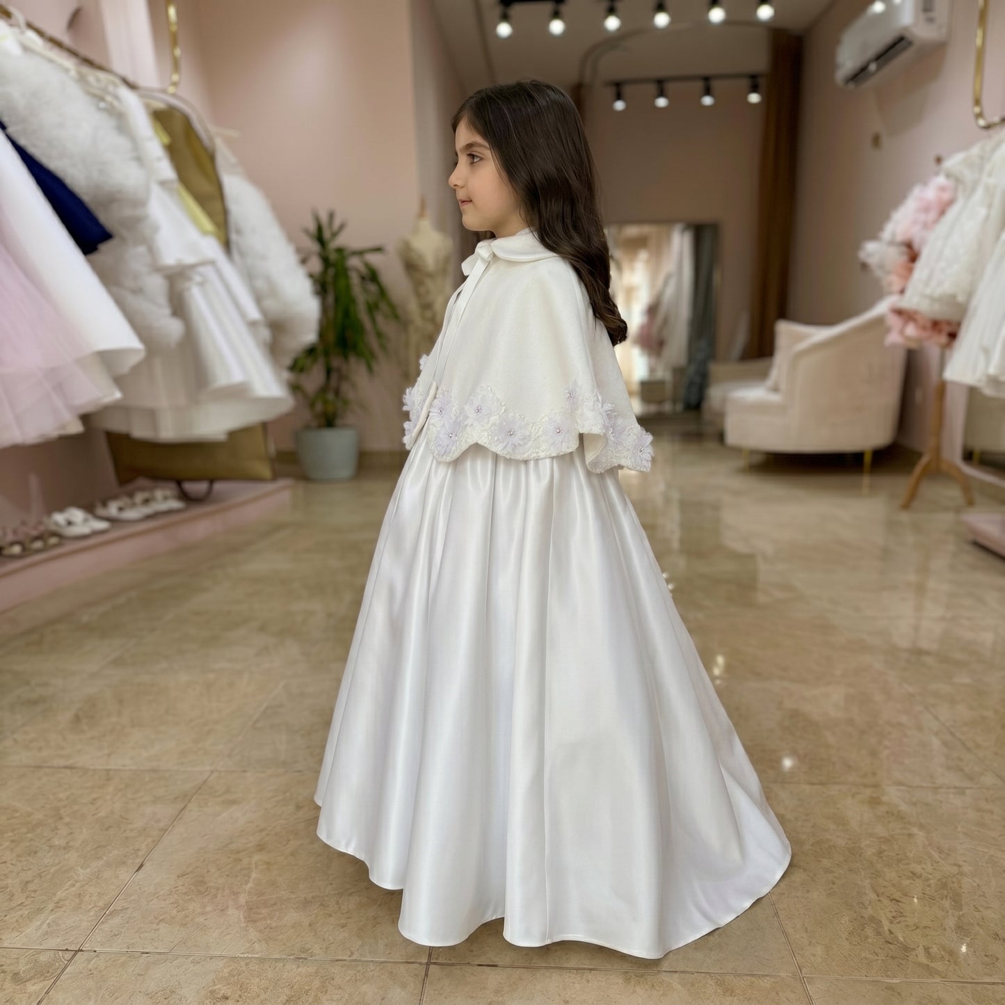 A Beautiful Handcrafted Cape Adorned with Delicate Crystals and Flora