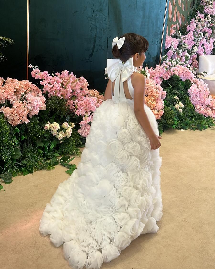 Elegant White Floral Appliqué Flower Girl Gown with Oversized Bow Back and Cape
